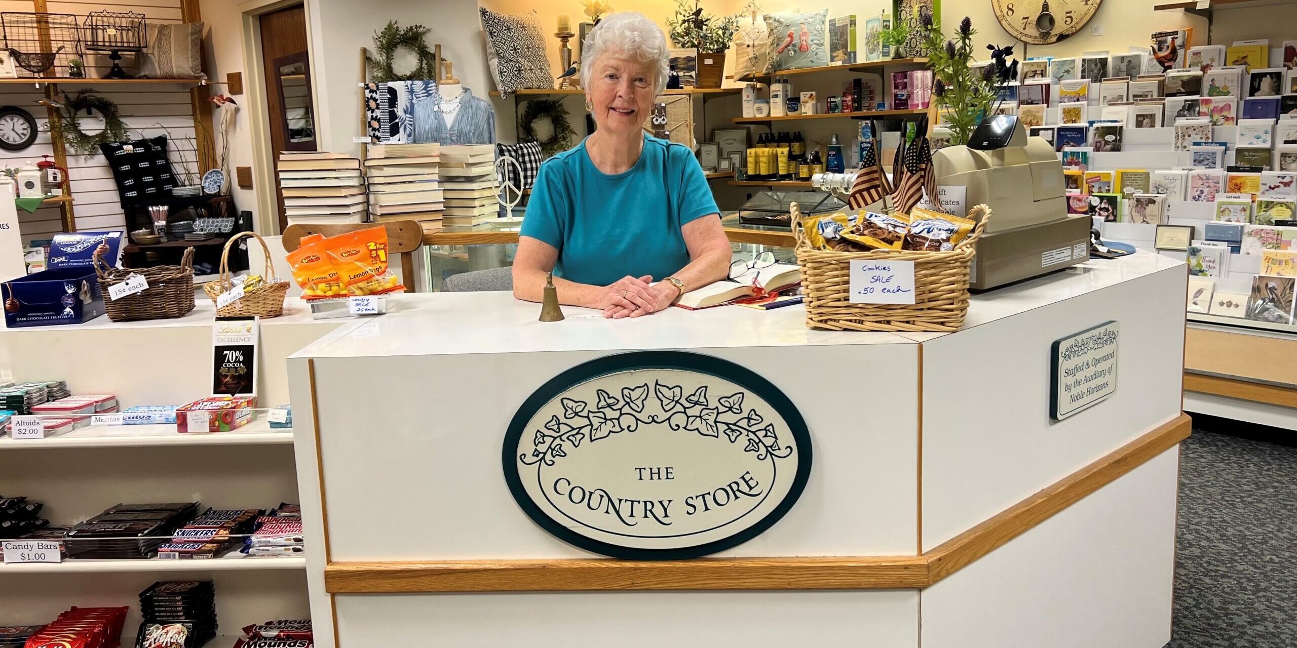 Longtime Auxiliary volunteer Ruth Adotte taking a break after helping customers at The Country Store